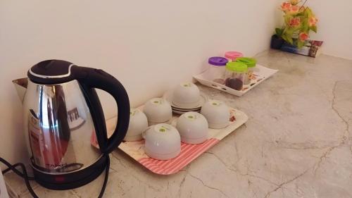 Set per la preparazione di tè e caffè presso Green Village