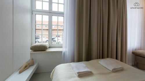 Кровать или кровати в номере City Center - Ogarna 1 Art in Apartment by Apartmore