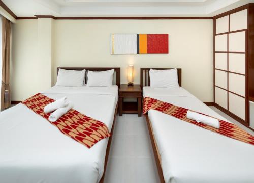 Katil atau katil-katil dalam bilik di Khon Kaen Orchid Hotel