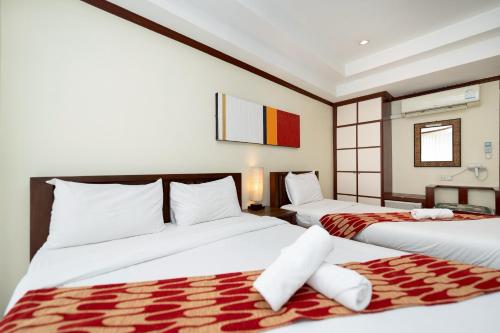 Katil atau katil-katil dalam bilik di Khon Kaen Orchid Hotel