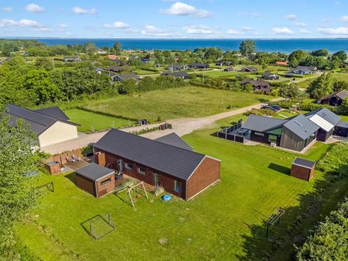 an aerial view of a farm with a barn at Holiday Home Gojana - 400m from the sea by Interhome in Nordborg
