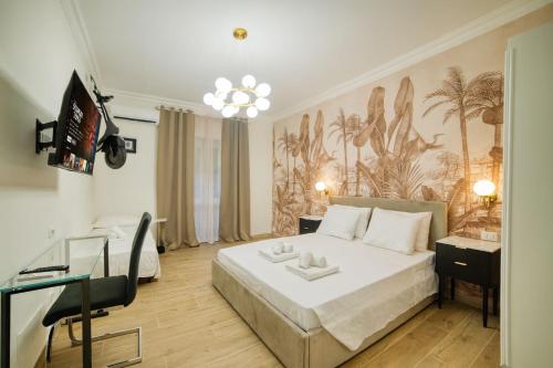 a hotel room with a bed and a desk at Radio Suites in Rome