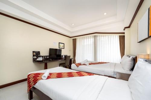 Katil atau katil-katil dalam bilik di Khon Kaen Orchid Hotel