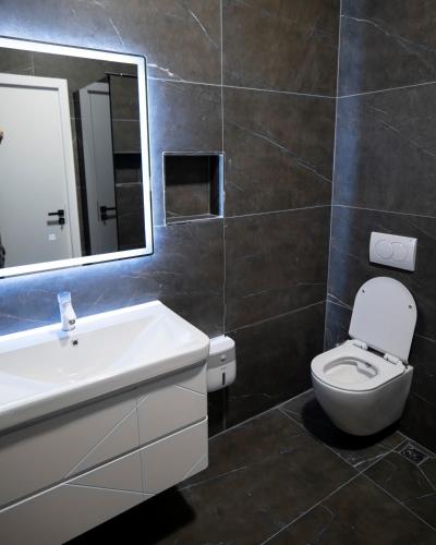Koupelna v ubytování Leo Hotel