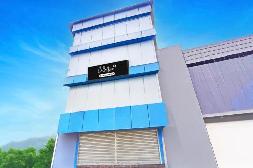 a building with a sign on the side of it at Super Collection O Prabhat Nagar Bareilly in Bareilly