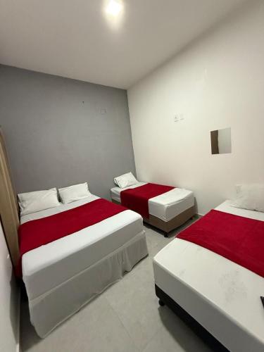 Postel nebo postele na pokoji v ubytování Lua Hotel