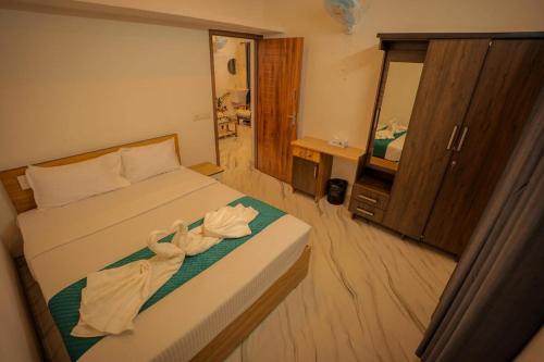 Postel nebo postele na pokoji v ubytování Cozy Nest Villa