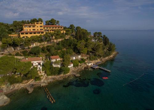 an aerial view of a house on an island in the water at Albergo Filippo II in Porto Santo Stefano