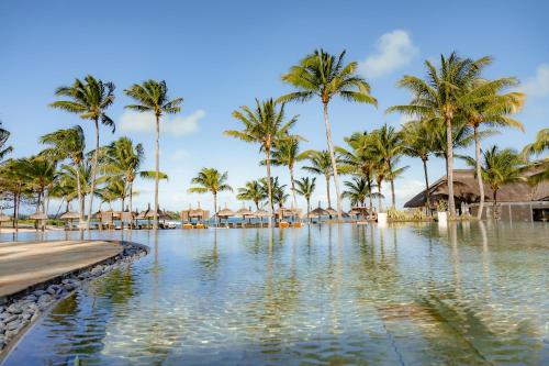 a pool at the excellence punta cana resort at Anahita Villa Lagoon in Grande Rivière Sud Est
