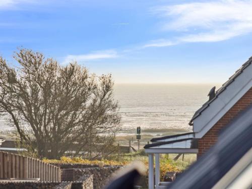 a view of the ocean from a house at Holiday Home Harriette - 100m from the sea by Interhome in Havneby