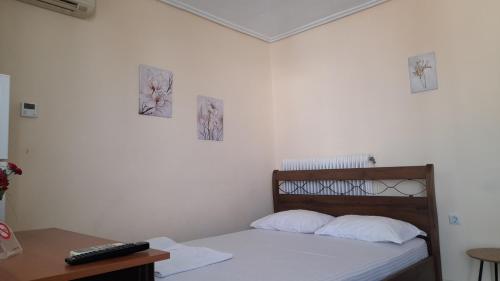 Postel nebo postele na pokoji v ubytování Απεριόριστη θέα