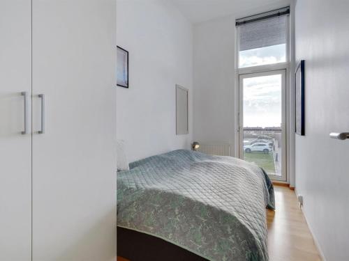 Ένα ή περισσότερα κρεβάτια σε δωμάτιο στο Apartment Pirkko - 100m from the sea by Interhome