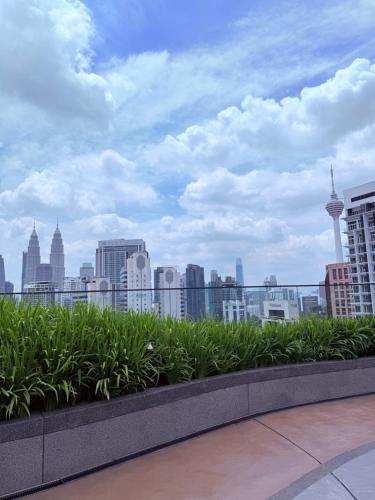 a view of the city from the roof of a building at Majestic Residence Klcc in Kuala Lumpur