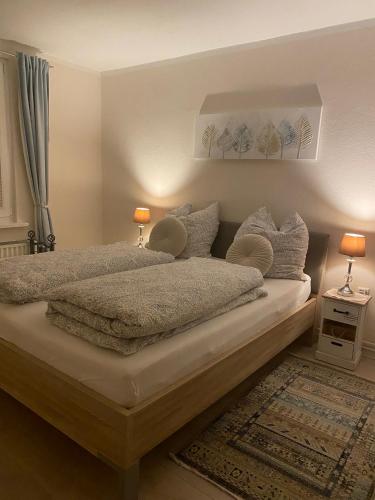 Ένα ή περισσότερα κρεβάτια σε δωμάτιο στο ULMA Residenz Peine