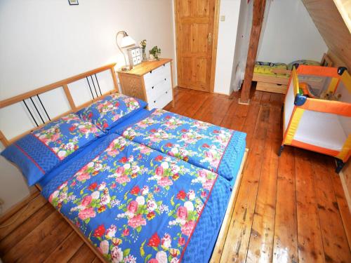 Postel nebo postele na pokoji v ubytování Cottage in Liberec with Sauna and Ski Nearby