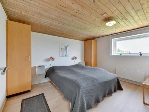 Ένα ή περισσότερα κρεβάτια σε δωμάτιο στο Holiday Home Saxe - from the sea by Interhome