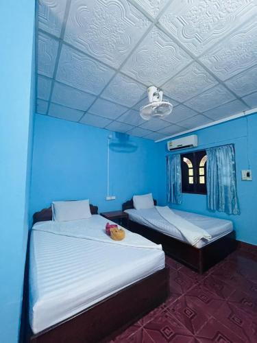 Katil atau katil-katil dalam bilik di Sipasert Guesthouse-Tadlo