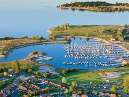 an aerial view of a marina with boats in the water at Le chalet de la Presquile in Giffaumont