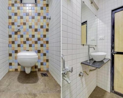 Koupelna v ubytování HOTEL OM SAI