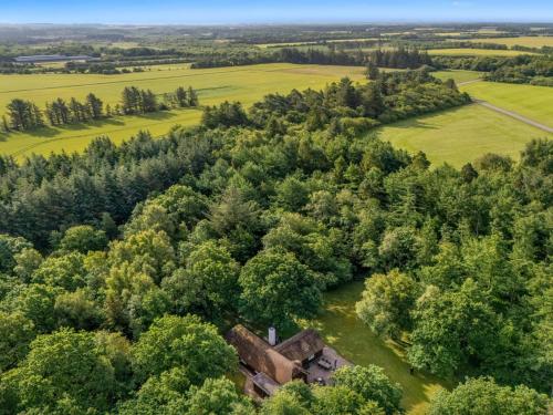 an aerial view of an old house in the forest at Holiday Home Fina - 15km from the sea by Interhome in Tim