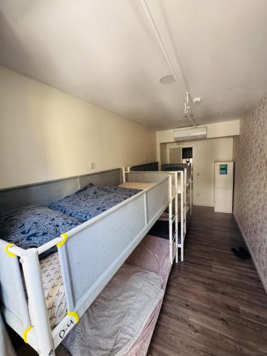 a bedroom with a bunk bed in a room at Majestic Hostel Porto in Porto