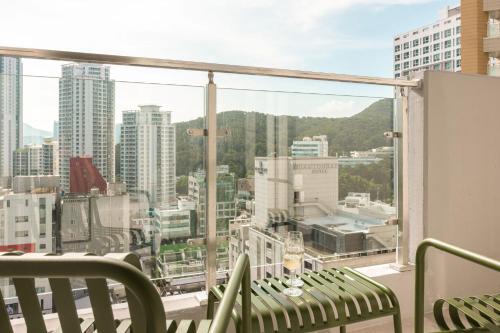 a balcony with a view of a city at 해운대 웨이브 Haeundae wave in Busan