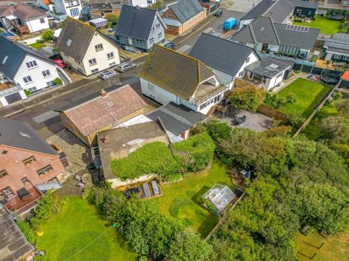 an aerial view of a house in a residential neighborhood at Holiday Home Eluisa - 300m from the sea by Interhome in Thyborøn