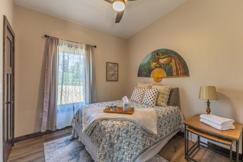 a bedroom with a bed and a window at Diamond in the Bluff - HOT TUB - Sleeps 6 in De Soto