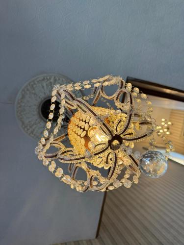 a beaded purse is hanging on a table at Historic Sion Bass Guest House in Fort Wayne