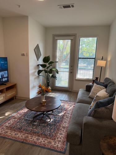 a living room with a couch and a coffee table at Mdelight Lodge in Frisco