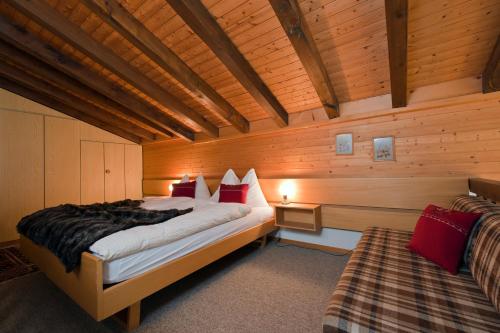 Postel nebo postele na pokoji v ubytování Chalet-Hotel Beau-Site