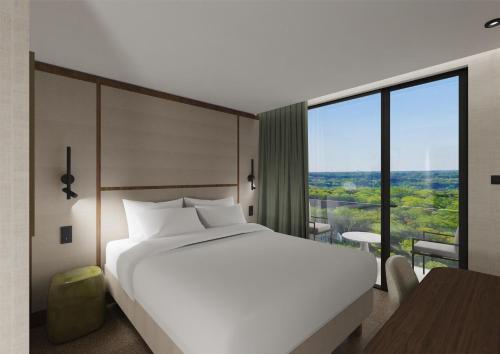 Katil atau katil-katil dalam bilik di Hotel & Spa Amoria La Baule, a member of Radisson Individuals