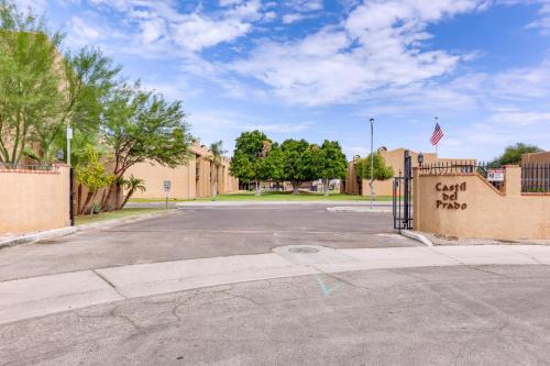 an empty parking lot with a fence and trees at 5 Mi to Colorado River Yuma Gem with Pool Access! in Yuma