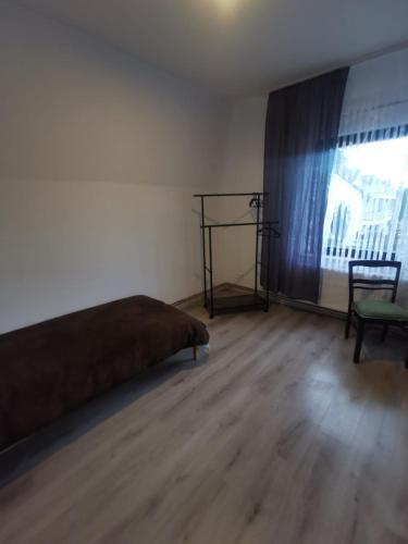 Postel nebo postele na pokoji v ubytování OneRoomStay