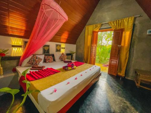 Ένα ή περισσότερα κρεβάτια σε δωμάτιο στο The Banda's Eco Villa