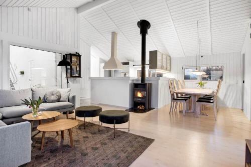 a living room with a couch and a table at LN1791-Hjorring-Hongardsvej-1 in Hjørring
