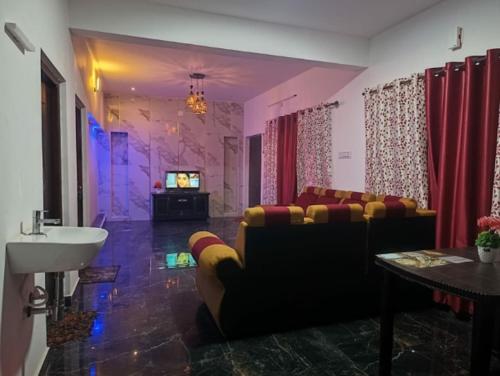 Televisyen dan/atau pusat hiburan di Tea Garden stays