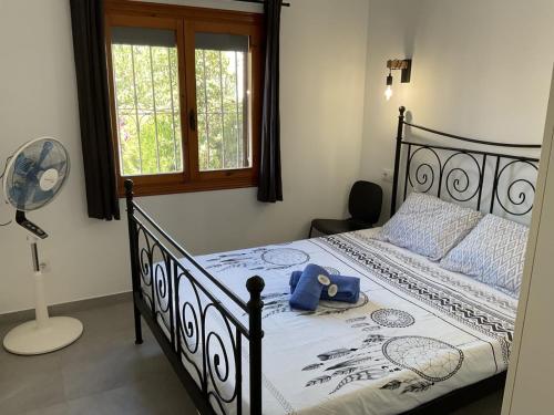 Ένα ή περισσότερα κρεβάτια σε δωμάτιο στο Casa Julieta
