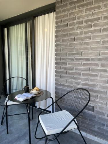 Posezení v ubytování Departamentos Exclusivos by FAZ - Forja, Instituto, Atenas, Plaza de la musica, Estadio Kempes, Clinica Reina Fabiola, Sanatorio Allende - Ubicacion Estrategica