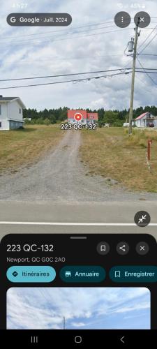 a view of a dirt road from a car window at Le nid marin in Gascons