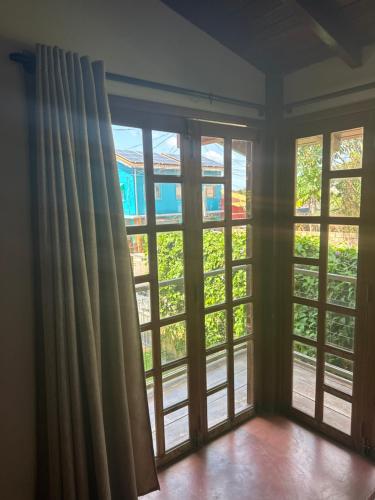 Μπαλκόνι ή βεράντα στο Quartos no Caribe Amazônico com vista para a Praia do Amor
