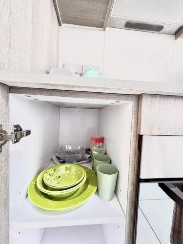 Una cocina o cocineta en Dream Orchards The Aura 344