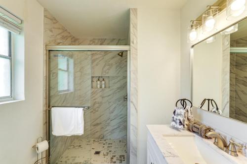 a bathroom with a shower and a sink at Near Shops and Eats Commuter-Friendly FWTX Home in Fort Worth