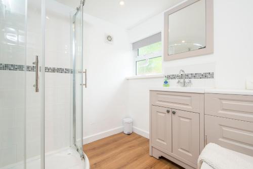 Phòng tắm tại Minim Cottage