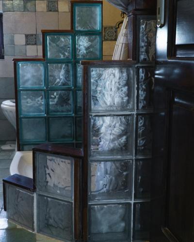 a set of glass block shelves in a bathroom at Villa Tethys Mountain Resort in Zákas
