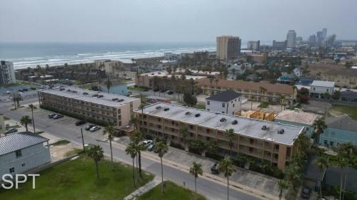 an aerial view of a city with a building at Fiesta Sol #110 home in South Padre Island