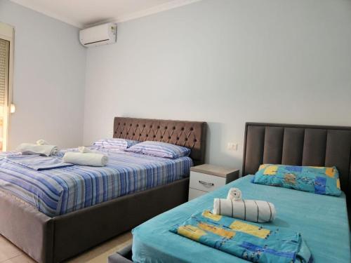 Katil atau katil-katil dalam bilik di KLM Apartments Waves & Sun