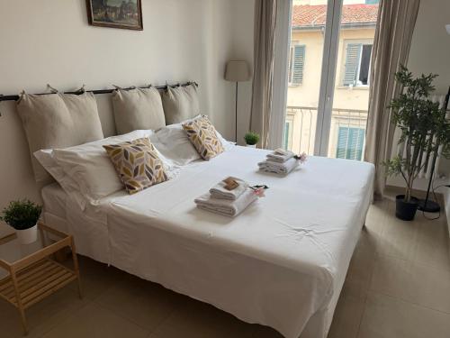 Postel nebo postele na pokoji v ubytování SMN-Duomo GuestHouse