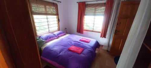 Ένα ή περισσότερα κρεβάτια σε δωμάτιο στο Busy Bee Nature Residence