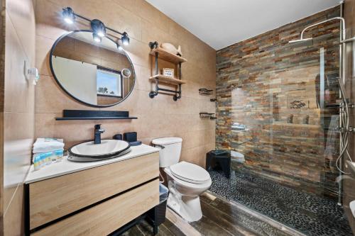 a bathroom with a sink and a toilet and a shower at Opal 233 in Palm-Eagle Beach